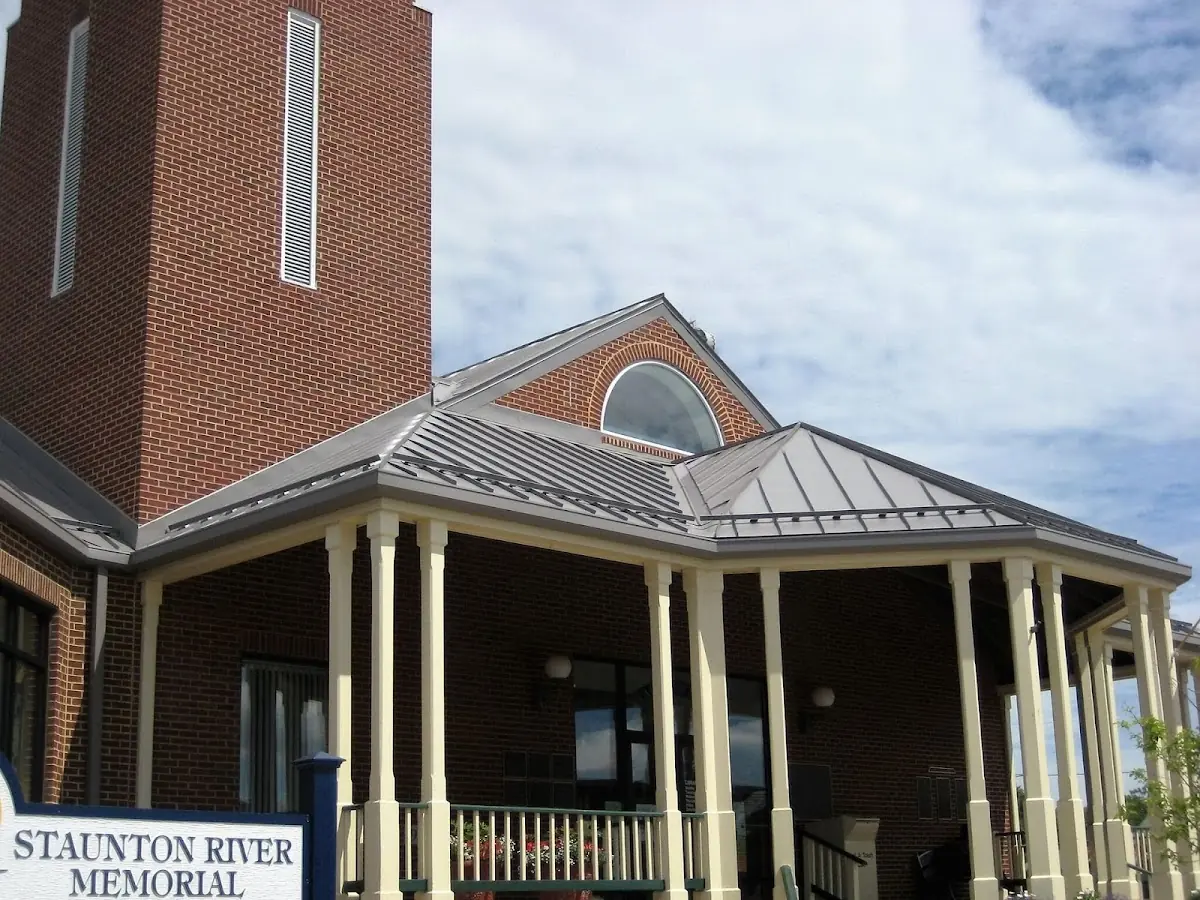 Skilled roofing craftsmen working on a residential roof in North Highland
